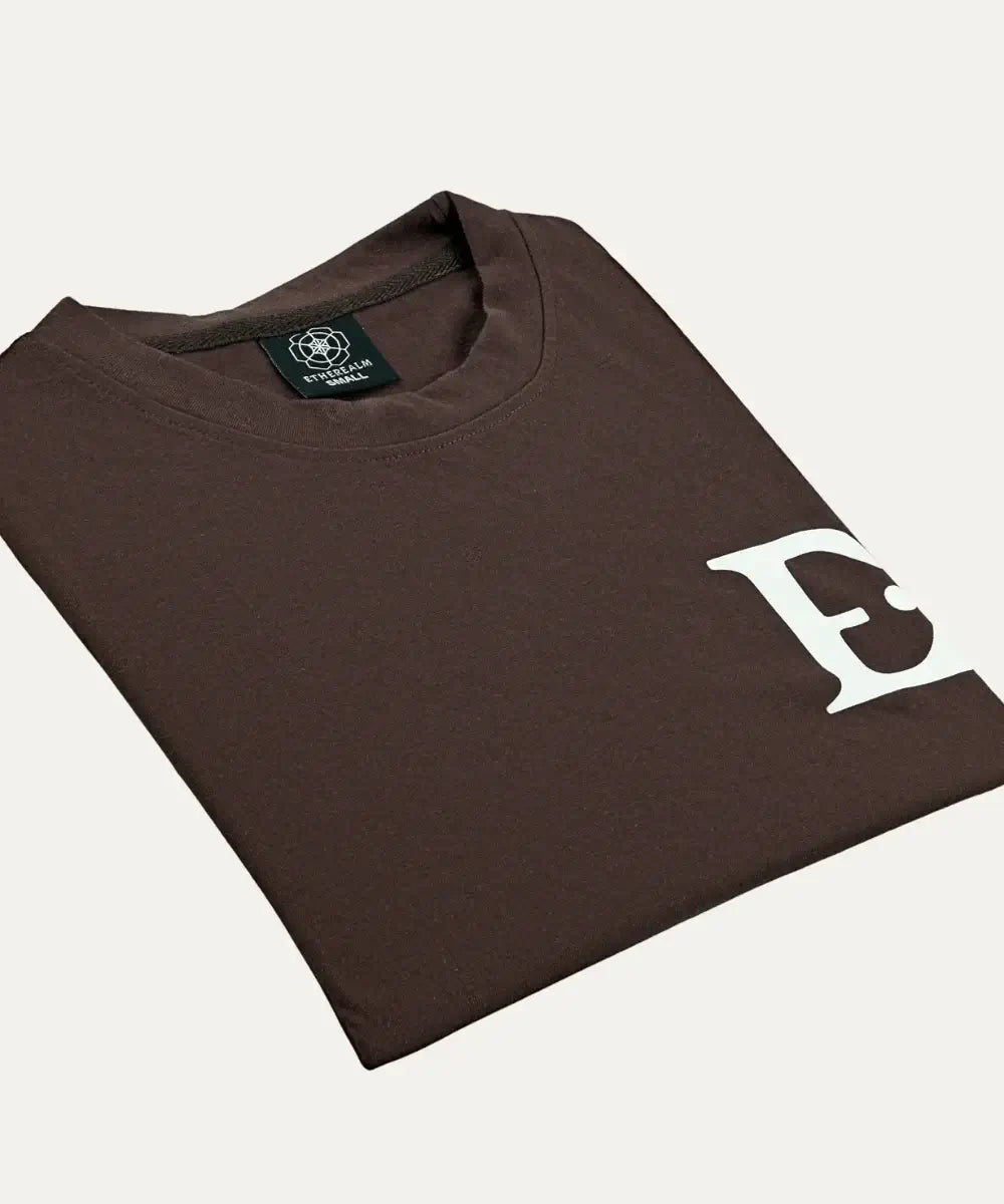 Fallen Angel Tee in brown with elegant graphics, showcasing relaxed lightweight fabric for warm climates.